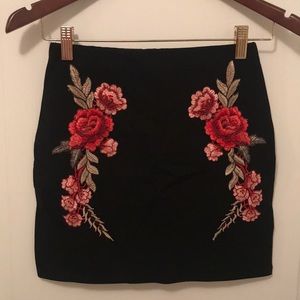 Women’s black mini skirt with floral embroidery